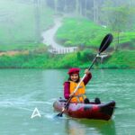 Sakshi Agarwal Instagram – Two mins into learning #kayaking and this beautiful weather and rain❤️ #kayakingadventures 
.
#wildplanet #adventure #resort #fun #natureaesthetic #adventurenthusiasts #instagramreels #feelitreelit #explore #explorepage #raining