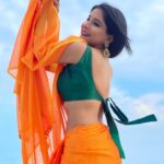 Sakshi Agarwal Instagram - My lips are the Gun! My smile is the Trigger! My kisses are the Bullets! Label me a KILLER or a QUEEN🔥 ——— or A Mango IceCream——(inspired by a comment🤪) . #terracevibes #saree #sareeaesthetics #orangesaree #sareevibes #loveforsaree #sexybackchallenge #sexyback #biggboss #vijaytv #sakshiagarwalsaree #sakshiagarwal . @the_trendy_turns Chennai, India