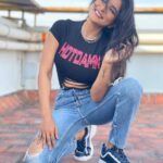 Sakshi Agarwal Instagram - I like who I am becoming🥰 . #sunset #terracepic #hotdamn #rippedtshirt #boyfriendjeans #filashoes #instastyle Chennai, India