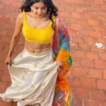 Sakshi Agarwal Instagram - She has fire in her veins and embers in her eyes🔥 . #lehenga #traditional #sakshiagarwal #biggboss #instapic #waistchain #beyourself #candid #soakingupthesun #instadaily #yellowblouse #lehenga #colourfuldupatta #fashion #lifestyle Chennai, India