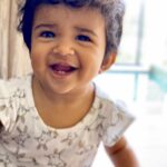 Sameera Reddy Instagram - 🍎hello lil teeth🍎We were waiting for you🤗 And with sheer delight she’s ready to bite into life❤️ #naughtynyra #positivevibes #messymama #teething #baby #momlife #babygirl #motherhood #keepingitreal ✅