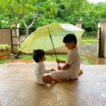 Sameera Reddy Instagram - Come rain or shine I’ll always be there for you❤️ #naughtynyra #happyhans #brotherandsister #momentslikethese #siblings #messymama #kids #momlife #motherhood #imperfectlyperfect #keepingitreal ☔️