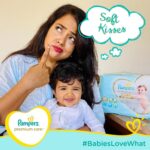 Sameera Reddy Instagram – Pampers asked me what my baby loves? Nyra lovessss soft sweet kisses and honestly I enjoy smothering her with them all day 😍
.
What do your babies love? Is it a special toy, a softie blankey or just tons of hugs and kisses!! ❤️
.
Comment below!👇🥰
.
#BabiesLoveWhat #PampersPremiumCare #PampersIndia #PampersBaby
#PampersMom #BabyCare #BabiesLoveSoft #Pampers #PampersTribe #happybaby #babygirl #naughtynyra #messymama @pampersindia