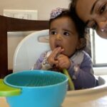 Sameera Reddy Instagram - Feeding Nyra is like playing fastest finger first ! 🤣 she wants to grab the bowl ! Chew the spoon ! And spit the food ! 🙃 #motherhood #fun #weaning #mommylife #momlife For mommies interested in her diet ! Nyra is almost 7 months . I started feeding her about 6 weeks ago! I started with only purées of avocado 🥑 ( raw soft mashed without the pit) I gave her that to begin with and it worked really well . I then introduced single semi liquid purées that need to be steamed and puréed - pear / apple / pumpkin / sweet potato / carrots . You can directly purée papaya / avocado / bananas. These are all@great first foods ! I also introduced ambemohar rice after a few days of weaning that is super nice for babies . I cook till very soft and then used a big eye sieve to give it a nice texture . ( @mumbaimummy this was a great tip thank you ) Moong Dal is very light so works well to start with rather that other dals. I make it with the rice sometimes or just on it’s own. ( I add pinch of hing and jeera powder ) FYI I don’t use any fancy steamers . Just a simple pressure cooker with a steel bowl inside . I do not add salt or sugar . Use your instinct when it comes to feeding . What the baby will love today they will fuss about tomorrow. But just don’t stress about it . It’s imp to continue the Breast Milk and /or Formula . My BIG TIP . I play the same song At every meal . It makes her comfortable and she knows it time to eat ! ❤️😃