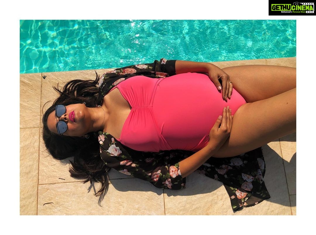 Sameera Reddy Instagram - Swimming has been so therapeutic this pregnancy ! To enjoy and celebrate my growing bump ๐Finally had to get a swimsuit that fit !. @seraphineindia ๐ ๐ถ @carolinalemkeberlin #maternityswimwear #pregnancy #pink #swimsuit #bump #baby #swimwear #sun #sunglasses . ๐ท @designer_ishwari