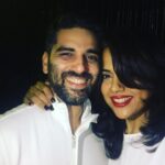 Sameera Reddy Instagram - My best friend and better half ❤️ I think this might be the first pic I’ve ever put up of Akshai and me on my official page. Having a shy husband makes you wonder how he chose to marry someone in my business but somehow it balances out . Being parents we rarely go out till the wee hours of the morning but we did last night ! this was our 4 am face . I’m amazed how ppl do this every weekend because I’m totally slammed today .. happy to be back with our little man . Super sweet Sunday . Life’s simple joys ⭐️ . P.s - my fav red lipper by @maccosmetics runaway red and @essiepolish #wicked on my nails saved my 4am face 🙃 . . . . . . . . . . #Sunday #love #maccosmetics #nars #essiewicked #essie #redlips #myman #4am #selfie#parentsbelike #couplegoals