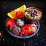Sameera Reddy Instagram - Chia & Buckwheat soaked with Nuts and Raisins in Cashew milk with beautiful vibrant fresh fruits! A balanced breakfast that’s enticing, colourful & positivity charged! Excited with my first box of strawberries of the season! #vegan #healthychoices #healthyeating #healthy #food #india #breakfast #mindful #happy #body #fresh #fruit #india #mumbai #eating #fit #wellness #fitmom #instafood #mumbaifoodie #quotes#shotoniphone Without black no Color has any depth ~ Amy Grant 🌱