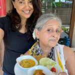 Sameera Reddy Instagram - 🍍Fruit Sabzi ? 🍌Banana mustard Raita, some paratha with a side of fresh tossed salad and a watermelon juice🍉 ! @manjrivarde Sassy Saasu wanted to help me with my fitness diet plus it is Summer and the weather is HoT hoT Hot 🥵 these Dishes are very easy and so yummy ! Especially the pineapple coconut curry which was a delicious surprise ! 🍍 🍍Pineapple Coconut Curry 1 pineapple chopped. Centre removed. 1 coconut milk 2 tablespoons besan flour 1 tablespoon jeera 1 teaspoon haldi powder 1 teaspoon red mirchi powder 2 tablespoons oil Heat oil in a vessel. Sputter the jeera, haldi and red mirchi in it. Stir. Add the pineapple pieces and some water to cook. Cover for 3/4 minutes. Open and add the coconut milk into which the besan has been dissolved. Mix it well with the pineapple and add salt to taste. Cover for 2/3 minutes till besan cooks and slightly thickens. Add coriander. Enjoy the sweet, salty and spicy curry! 🍈Guava Subzi 2 guavas chopped 2 teaspoons oil 1 teaspoon mustard seeds 1 teaspoon methi/fenugreek seeds 1/2 tsp haldi 1 tsp res mirch powder 1 tablespoon aamchur powder or 1 lemon 1 tsp sugar Heat oil and sputter the mustard seeds, then brown the methi seeds, add haldi and chilli powders. Add guava pieces, salt water and cover and cook for 5 minutes. Add aamchur powder and coriander. 🍌Banana Raita 2 ripe bananas mashed 1 tablespoon mustard seeds soaked in water and then frothed. Salt 1 cup dahi Mash the bananas well. Add all the other ingredients and mix well. Serve with parathas ,a fresh summer salad 🥗 and a tall glass of cooooool watermelon 🍉 juice 🥤 💃 Yummmmmmm❤️ . Always fun cooking with my stylish Saasu! 🌟😍 Let us know how your versions of our Summer Fruit Fiesta turned out 🌟 #messymamaandsassysaasu #saasbahu #cookingvideo #summer #fun ✨