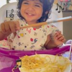 Sameera Reddy Instagram - My Lil Maestro Baby enjoying her noodles & music with her chopsticks 🥢🎼🎶🤩 #saturdaynight done right ✅ #messymama #naughtynyra #momlife #fun #mozart #classicalmusic #maestro 🌟