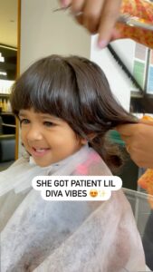 Sameera Reddy Instagram - Diva vibes🌟Mama can’t cut my hair no more🤓My baby girls 1st salon haircut 💇‍♀️ #salon #firsttime #naughtynyra #haircut #momlife