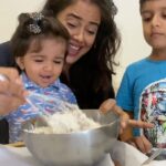 Sameera Reddy Instagram - I love having a great time with my two munchkins and what better way than to make fun goodies with them ! Hope you also enjoy making the Easy Peasy Chocolate Chip cookies like we did !! ❤️❤️🤩 . 🍪1/2 cup castor sugar 3/4 cup brown sugar 1/2 cup melted butter 1 egg 1 1/4 cup flour 1/2 tsp salt 1/2 tsp baking powder 1/2 tsp baking soda 100 Gm Chocolate broken up . 🍪Whisk the sugars, butter and egg until nice soft ribbons . Yes I added mine later because I ran out of butter 🤣 but Handy Hans got me some in time ! Add the chopped chocolate . You can add fresh vanilla off the pod or vanilla Extract / essence . You can also omit the vanilla if you don’t have it . 🍪In Another bowl Sift the flour, baking powder , baking soda , salt and mix lightly till combined . Don’t over mix. Just till Combined like a cookie dough . Scoop with an ice cream scoop on a baking sheet ( a lil far apart ) and bake at 175*C for 12- 15mins . Let it cool and enjoy ! 👉🏼 store in airtight container 👉🏼always measure in a measuring cup . Tap the cup after filling it to level out to make sure you have the right amount . ESP with the flour. 👉🏼scoop in on baking paper 👉🏼Place the scoops a lil far apart as they will melt and flatten . 👉🏼 every oven temp is different . Don’t over bake. Just till the cracks come . Don’t open the oven door too many times . 👉🏼 don’t over mix the dough after adding the flour 👉🏼you can rest the cookie dough in a cling film for 20 mins in the fridge . I didn’t because I have impatient kids 🤣 👉🏼do this with your kids and make a mess and have fun that’s what it’s all about ❤️ . #messymama #naughtynyra #happyhans #funwithkids #momlife #timepass #baking #imperfectlyperfect #mom #chocolate #cookies #chocolatechipcookies