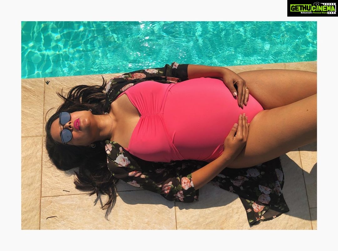Sameera Reddy Instagram - #fridayflashback May 2019 🏖 Nyra gave me swag all 9 months before she rocked my world! I truly enjoyed my pregnancy, flaunted every curve and loved every change in my body! It’s very easy to feel not sexy when you are pregnant because of all the moods swings and increase in hormone levels . Don’t sweat the small stuff and Please enjoy your pregnancy ladies! Nothing sexier than loving every phase of your body👍🏻❤️ #imperfectlyperfect #messymama #pregnancy #throwback #friday #preggo #naughtynyra #weekendvibes #loveyourself #bigisbeautiful #motherhood #momlife #swag 📷 @designer_ishwari