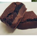 Sanam Shetty Instagram - WholeWheat Chocolate Cake 🎂 Ingredients for cake mix: Whole Wheat flour -150 gms Cocoa powder - 30 gms Brown Sugar - 100 gms Baking Powder - 1 tspn Baking Soda - 1 tspn Milk - 100 ml Thick Curd - 100 ml Coconut oil - 70 ml Egg - 1 Vanilla essence - 1 tspn Hot water - 50 ml (adjust slightly according to creamy cake mix consistancy) . Ingredients for topping: Chocolate compound bars (chopped into tiny bits) or Chocolate sauce . Preparation: * On the stove place a large nonstick handi or large cooker (or aluminium handi) on high flame and pour in two handfull of white salt (this is to avoid burning of the vessel bottom). . * Inside the vessel, place a steel stand or any small steel plate to give height. * Close the lid of the vessel fully and keep in medium flame for 20 mins (this is the replacement for oven preheat). . Cake mix Mix all the ingredients in the same order listed one by one. While blending properly with a manual egg whisker/beater or electronic egg beater starting with the flour first. Blend till you get a smooth creamy consistency. . Now pour the cake mix evenly into a greased cake mould container. (With butter paper optional). Place this container with the cake mix inside the pre heated vessel on the stand and close the lid immediately and continue on medium flame for 50 minutes. . Just ten mins before turning off the stove, add tiny chopped chocolate bars on the top evenly and close the lid back. . Once fully cooled, place a large plate over it and flip it to get the cake out. Flip the cake again back to get the chocolate topped side up. Healthy chocolate cake is ready! 🎂❤️ . You can replace chocolate bars topping with chocolate sauce as icing! #samskitchen #chocolatecake #novenbaking #happyweekend❤️