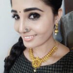 Sandra Amy Instagram - Ths s d new design from @trinetra_india ,wch is a traditional gold type jewelry with full of bird design,wt green nd red stones..😍😍😍😍😍😍and d earrings r cute jhumka wt bird designed stud.. One f d finest design i gt recently.. Thnk u soo mch @trinetra_india fr ths added beauty n me... Do chk thr page fr mre amazin collections😍😍😍😍