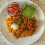 Sandra Amy Instagram - #lunchplate # mutton biriyani #hariyali kebab #mint raitha sapitu thoongitay 😷👨‍👩‍👧‍👧 #lunchplate # mutton biriyani #hariyali kebab #mint raitha
