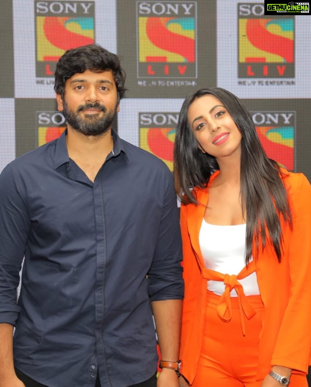 Sanjjanaa Instagram - It was a delight yesterday to witness the launch of , #Aivar my official tamil debut project trailer and my first stepping stone into the tamil film industry / tamil web series on the @sonylivindia application exclusively at #tajcoramandel , it was lovely to be accompanied by my mentor @ckkumaravel sir , @sameerbharatram , & the entire team of #Aivar , my cast #ashwinkakamanu with my directors #harsha ji & #vijay ji Of #brahhmacinecreations & my buddy @preetisingla ❤️❤️ bless us while the season one is getting ready to release in August and we are sure to shoot and rock it with the forthcoming season two as well in 2020 ! Yay ! Please watch the promo which is in set in my pictures . Hair & make up by naturalssalon / @page3annanagar . Thank you @ckkumaravel sir your team always makes me look so lovely 💝