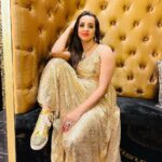 Sanjjanaa Instagram - Here is a Bling Gold outfit i flaunted yesterday ... Specially made for me by Celebrity Designer my Favourite @chandangowda_official & I pared it with my super comfy @louboutinworld shoes setting New Fashion Funky Goals ❤️❤️❤️ Gold being my most Favourite shade coincidently the theme of the evening was "Black & Gold " while I attended the Launch of the "Most Premium Salon" I have Witnessed in #Banglore City @the.nailartistry , ... they have Ventured into #Bengaluru with the 3rd branch expanding there territory after Concurring " Chennai " & Kochi with There Luxurious chain of Salons .... It's a Class of a Salon with all the Salon services provided under one Roof .. including complex services like Eyebrows micro blading , designer Nail Arts and a lot lot more … one would love to live in & Not go back home from this space ... With the " Black & Gold " Glamourous shimmery @versace interiors it makes one feel like a Egyptian " King or Queen " visiting this palace like Paradise in indiranagar , 100 feet Road to be Pampered to Eternity & Bliss ... You Must visit this Unisex #Salon to witness & Experience my words in person ... Perhaps #TheNailArtistry has taken #Nammabengaluru city’s Standards a couple of Notches Higher in the Salon industry ... with having No other Salon in competition with them !!! Hair by @shruthireddy Make up by @sumakeover_by_lavanya Beautifully Photographed by @manu_mj_joe Outfit curated by #Chandangowda also Check out his store @rentyourlook_by_chandangowda Bangalore, India