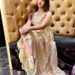 Sanjjanaa Instagram - Here is a Bling Gold outfit i flaunted yesterday ... Specially made for me by Celebrity Designer my Favourite @chandangowda_official & I pared it with my super comfy @louboutinworld shoes setting New Fashion Funky Goals ❤️❤️❤️ Gold being my most Favourite shade coincidently the theme of the evening was "Black & Gold " while I attended the Launch of the "Most Premium Salon" I have Witnessed in #Banglore City @the.nailartistry , ... they have Ventured into #Bengaluru with the 3rd branch expanding there territory after Concurring " Chennai " & Kochi with There Luxurious chain of Salons .... It's a Class of a Salon with all the Salon services provided under one Roof .. including complex services like Eyebrows micro blading , designer Nail Arts and a lot lot more … one would love to live in & Not go back home from this space ... With the " Black & Gold " Glamourous shimmery @versace interiors it makes one feel like a Egyptian " King or Queen " visiting this palace like Paradise in indiranagar , 100 feet Road to be Pampered to Eternity & Bliss ... You Must visit this Unisex #Salon to witness & Experience my words in person ... Perhaps #TheNailArtistry has taken #Nammabengaluru city’s Standards a couple of Notches Higher in the Salon industry ... with having No other Salon in competition with them !!! Hair by @shruthireddy Make up by @sumakeover_by_lavanya Beautifully Photographed by @manu_mj_joe Outfit curated by #Chandangowda also Check out his store @rentyourlook_by_chandangowda Bangalore, India