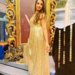 Sanjjanaa Instagram - Here is a Bling Gold outfit i flaunted yesterday ... Specially made for me by Celebrity Designer my Favourite @chandangowda_official & I pared it with my super comfy @louboutinworld shoes setting New Fashion Funky Goals ❤️❤️❤️ Gold being my most Favourite shade coincidently the theme of the evening was "Black & Gold " while I attended the Launch of the "Most Premium Salon" I have Witnessed in #Banglore City @the.nailartistry , ... they have Ventured into #Bengaluru with the 3rd branch expanding there territory after Concurring " Chennai " & Kochi with There Luxurious chain of Salons .... It's a Class of a Salon with all the Salon services provided under one Roof .. including complex services like Eyebrows micro blading , designer Nail Arts and a lot lot more … one would love to live in & Not go back home from this space ... With the " Black & Gold " Glamourous shimmery @versace interiors it makes one feel like a Egyptian " King or Queen " visiting this palace like Paradise in indiranagar , 100 feet Road to be Pampered to Eternity & Bliss ... You Must visit this Unisex #Salon to witness & Experience my words in person ... Perhaps #TheNailArtistry has taken #Nammabengaluru city’s Standards a couple of Notches Higher in the Salon industry ... with having No other Salon in competition with them !!! Hair by @shruthireddy Make up by @sumakeover_by_lavanya Beautifully Photographed by @manu_mj_joe Outfit curated by #Chandangowda also Check out his store @rentyourlook_by_chandangowda Bangalore, India