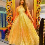 Sanjjanaa Instagram - Here is a Bling Gold outfit i flaunted yesterday ... Specially made for me by Celebrity Designer my Favourite @chandangowda_official & I pared it with my super comfy @louboutinworld shoes setting New Fashion Funky Goals ❤️❤️❤️ Gold being my most Favourite shade coincidently the theme of the evening was "Black & Gold " while I attended the Launch of the "Most Premium Salon" I have Witnessed in #Banglore City @the.nailartistry , ... they have Ventured into #Bengaluru with the 3rd branch expanding there territory after Concurring " Chennai " & Kochi with There Luxurious chain of Salons .... It's a Class of a Salon with all the Salon services provided under one Roof .. including complex services like Eyebrows micro blading , designer Nail Arts and a lot lot more … one would love to live in & Not go back home from this space ... With the " Black & Gold " Glamourous shimmery @versace interiors it makes one feel like a Egyptian " King or Queen " visiting this palace like Paradise in indiranagar , 100 feet Road to be Pampered to Eternity & Bliss ... You Must visit this Unisex #Salon to witness & Experience my words in person ... Perhaps #TheNailArtistry has taken #Nammabengaluru city’s Standards a couple of Notches Higher in the Salon industry ... with having No other Salon in competition with them !!! Hair by @shruthireddy Make up by @sumakeover_by_lavanya Beautifully Photographed by @manu_mj_joe Outfit curated by #Chandangowda also Check out his store @rentyourlook_by_chandangowda Bangalore, India
