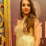 Sanjjanaa Instagram - Here is a Bling Gold outfit i flaunted yesterday ... Specially made for me by Celebrity Designer my Favourite @chandangowda_official & I pared it with my super comfy @louboutinworld shoes setting New Fashion Funky Goals ❤️❤️❤️ Gold being my most Favourite shade coincidently the theme of the evening was "Black & Gold " while I attended the Launch of the "Most Premium Salon" I have Witnessed in #Banglore City @the.nailartistry , ... they have Ventured into #Bengaluru with the 3rd branch expanding there territory after Concurring " Chennai " & Kochi with There Luxurious chain of Salons .... It's a Class of a Salon with all the Salon services provided under one Roof .. including complex services like Eyebrows micro blading , designer Nail Arts and a lot lot more … one would love to live in & Not go back home from this space ... With the " Black & Gold " Glamourous shimmery @versace interiors it makes one feel like a Egyptian " King or Queen " visiting this palace like Paradise in indiranagar , 100 feet Road to be Pampered to Eternity & Bliss ... You Must visit this Unisex #Salon to witness & Experience my words in person ... Perhaps #TheNailArtistry has taken #Nammabengaluru city’s Standards a couple of Notches Higher in the Salon industry ... with having No other Salon in competition with them !!! Hair by @shruthireddy Make up by @sumakeover_by_lavanya Beautifully Photographed by @manu_mj_joe Outfit curated by #Chandangowda also Check out his store @rentyourlook_by_chandangowda Bangalore, India