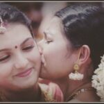 Saranya Mohan Instagram - My favourite .my sister ammu aka Sukanya #Wedding#marriage#kiss#saranyamohan #marriage #sibling#sister#mallu#instadaily
