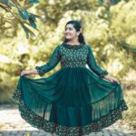 Sarayu Mohan Instagram - Another beautiful dress from @lepapillonkochi5 bottle green frock and sunflower clip...ready for a girly day♥️ Clicked by @_story_telle__r 🥰 Chottanikkara, India