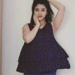 Shriya Sharma Instagram - No i haven't gained weight, its just the flowey top and wind. :P #PhotoshootStills #PoserForLife Pic credits - @portrait_photographyyy