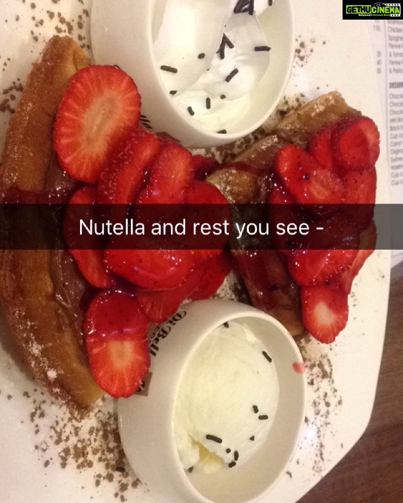 Sneha Ullal Instagram - The sin.the must eat.#dibellacoffee #nutellawaffle with strawberry, icecream and #whippedwhat cream.
