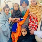 Sonia Mann Instagram - Sardar Simranjit Singh Mann with Biba Sonia Kaur Mann with little girls of village Mandiala wearing a Hijab. In Sikhism, it Allows full Religious Freedom. Karnatka Muslims should visit the Punjab to assert and practice religious freedom as per the Constitution and the Sikh way of life. #karnataka #hijab @sardar_simranjit_singh_mann