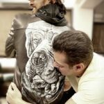 Sudeep Instagram - A line SK sir said when he put this jacket on to me. "I never thought I would ever part with this jacket" . He got his fav pets pic painted on this jacket in its memory. I know what it mens to part with something that's deeply connected. Thank u for this luv sir.