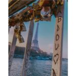 Sushma Raj Instagram - Tying a "love lock" on to this bridge before throwing the key into the River Seine beneath is a tradition (not French though) . This gesture is said to represent a couple's committed love. It is no longer encouraged as the load of the keys is bringing the bridge down. #lovelock #paris Paris, France