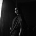 Angana Roy Instagram - I will love the light for it shows me the way, yet I will endure the darkness because it shows me the stars. -Og Mandino Captured by : @__blatherskite_ #mondaypost #bnw #bnwfeed #lightanddarkness #igdaily #mondaymood #portrait #sareelovers #sareeindia #indianwear #portraitphotography #lovefromA