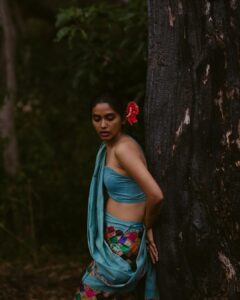 Anjali Patil Instagram - On the very early morning we all walked inside the forest. 
I slowly transformed, navigating through thorns and whispering with the trees, sky and birds while @aishwaryashok captured magic in each frame. 
For me, 
Van Gogh / Irusaayi / Vaanvil are fragile and strong, real and magical, fire and water at the same time!
@kuthiraivaalthefilm is running in theatres with overwhelming reviews from the critics and audience.
Forever grateful for this magical moment!

@yaazhifilms @kuthiraivaalthefilm

Ideated by : @aishwaryashok
Costume Design : Datcha dayal
Styling: @binita_ramanathan
Dop : @haya_dp

Yaazhi Team :
@aravindnaga.nft @m0shuu
@palaniappan_kathir
