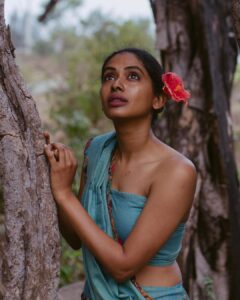 Anjali Patil Instagram - On the very early morning we all walked inside the forest. 
I slowly transformed, navigating through thorns and whispering with the trees, sky and birds while @aishwaryashok captured magic in each frame. 
For me, 
Van Gogh / Irusaayi / Vaanvil are fragile and strong, real and magical, fire and water at the same time!
@kuthiraivaalthefilm is running in theatres with overwhelming reviews from the critics and audience.
Forever grateful for this magical moment!

@yaazhifilms @kuthiraivaalthefilm

Ideated by : @aishwaryashok
Costume Design : Datcha dayal
Styling: @binita_ramanathan
Dop : @haya_dp

Yaazhi Team :
@aravindnaga.nft @m0shuu
@palaniappan_kathir