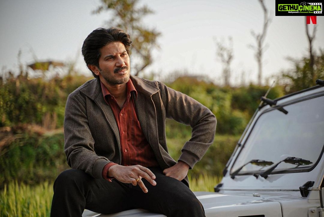 Dulquer Salmaan Instagram - Put on your seatbelts and get ready for a ride back to the 90s with me. Here’s presenting my first look from Guns & Gulaabs, my first ever webseries and my first collab with the amazing duo @rajanddk. @rajkummar_rao, @gouravadarsh, @tjbhanu, @gulshandevaiah78 and our other talented co-stars will join me for this thrilling ride. 🚗 Guns & Gulaabs is created, produced & directed by @rajanddk @d2rfilms , coming soon on @netflix_in 🔫🌹