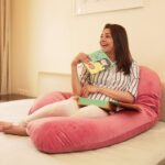 Kajal Aggarwal Instagram - Introducing my dearest friend during my Pregnancy. This Pregnancy Pillow manages common conditions like neck, shoulder & back pain, reduces acid reflux and makes sleeping an abundantly luxurious experience. I can sleep, recline & work with ease, and this pillow always finds the most comfortable position for me. Go for it girls, this cosy #pregnancypillow by @quiltcomfort is a first of its kind in many ways. #ad