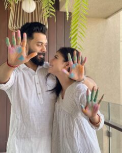 Mouni Roy Instagram - May your lives forever be filled with colours of joy, love & laughter 
💙💚💛🧡❤️💜🖤🤍🤎
HAPPPPPYYYYYYY HOLIIIIIIIIIIIII 💦 
#ourfirst 🔆🔱