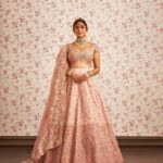Mrunal Thakur Instagram - Mrunal Thakur for Mrunalini Rao An Exquisite Bridal Collection Mrunal is wearing a blush satin organza lehenga with our signature 𝐳𝐚𝐫𝐝𝐨𝐳𝐢 and thread embroidery on the skirt. Tying the look together with a 𝐫𝐚𝐰 𝐬𝐢𝐥𝐤 blouse accentuated with paan neckline and petal sleeves. Muse @mrunalthakur Stylist @devs213 Assistant Stylist @krutikaa_sharma HMU @missblender @nishisingh_muah Photography @chandrahas_prabhu Jewellery @vasundharadiamondrf Production @studiolittledumpling Marketing Agency @lovestruckcowhq Now in stores. #MrunaliniRaoMuse #BridalCollection