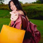 Narelle Kheng Instagram - I think I need more consistency in my life so I’ve decided that this will be my orange/angbao 🍊🧧 bag FOREVER, and I’ll come every Chinese New Year with angbaos overflowing so all the kids will be 🤑 when they look at the bag but I’ll be like 😏 bow to me first. Jkjksksksksks #CoachNY #CoachSS22 @coach