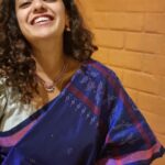 Nithya Menen Instagram - Tangaliya or Daana weaving 🧵 from Gujarat is mainly practiced by the Dangasia community. It's history spans back over 700 years ! :) 🕰 The legend goes, that a young man from the shepherding community of Bhadwad , fell in love with a young lady from a neighbouring weaving community🧶 and married her . His family disapproved of the match, and the young couple were made unwelcome. So they settled with her family of weavers and he continued to herd sheep. As he learnt the craft of weaving, he started to use the wool from his sheep 🐑 and thus the art of Tangaliya weaving came into being ! Within the Dangasias and Bhadwads communities, no special occasion was complete without draping or gifting tangaliya weave This craft was unknown to the world until 2007-2008, when it received the GI (Geographical Indication) certification, during the design intervention project by NIFT. The Dangasia community became well known for their tangaliya weaving. However, when the project ended the system started to lose its dynamics. Today, with the introduction of less expensive, printed textiles in the market, many traditional weavers and their descendants are sustaining themselves by working as labourers in factories and farms or migrating to the cities in search of working opportunities. @isha.savetheweave Thank you @lakkarajusailaja for letting me wear your mothers necklace🤎🤎 😊