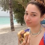 Tamannaah Instagram - Could get used to lunch time looking like this🌊☀️🏖🍔 @movenpickkuredhivarumaldives #movenpickmaldives #movenpickkuredhivarumaldives #wemakemoments @oneaboveglobal Mövenpick Resort Kuredhivaru Maldives