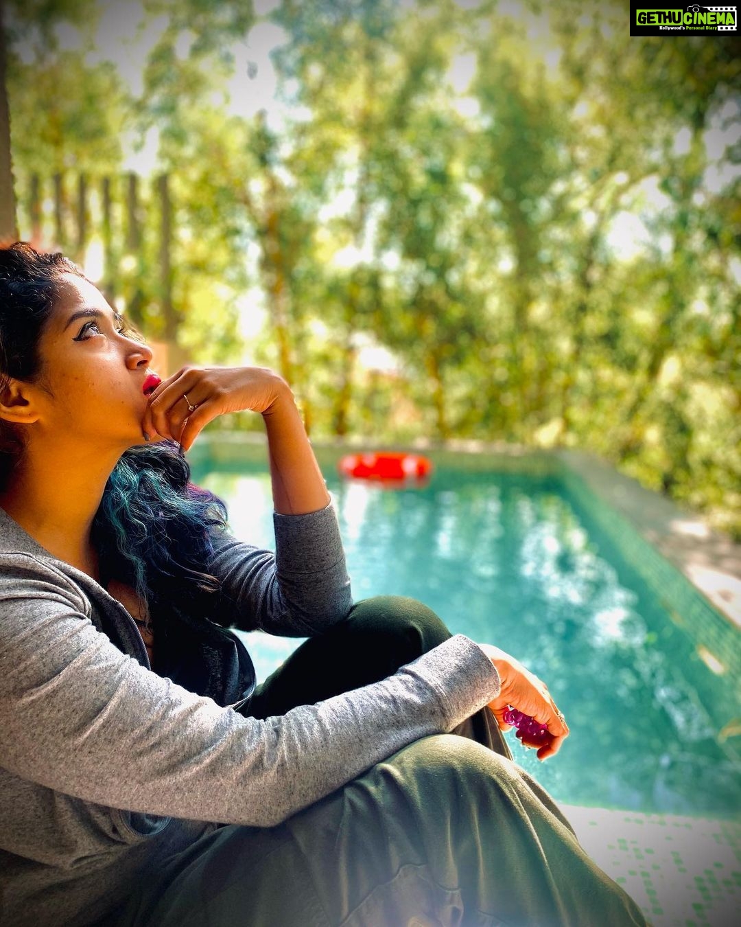 Abhirami Suresh Instagram - John Lennon once said, “ One thing you can't hide - is when you're crippled inside “ .. True that. But we could embrace the same for having a pure heart? So let’s dance in the rains with wet eyes now knowing enough or maybe knowing too much about whatsoever it might be that’s causing us the same. :) #Love #moodygrams #vsco #mood #rainynight #scribbleday #explore #hypebeast @blusalzhotelsandresorts @teaterrainresorts Tea Terrain Resorts and Spa
