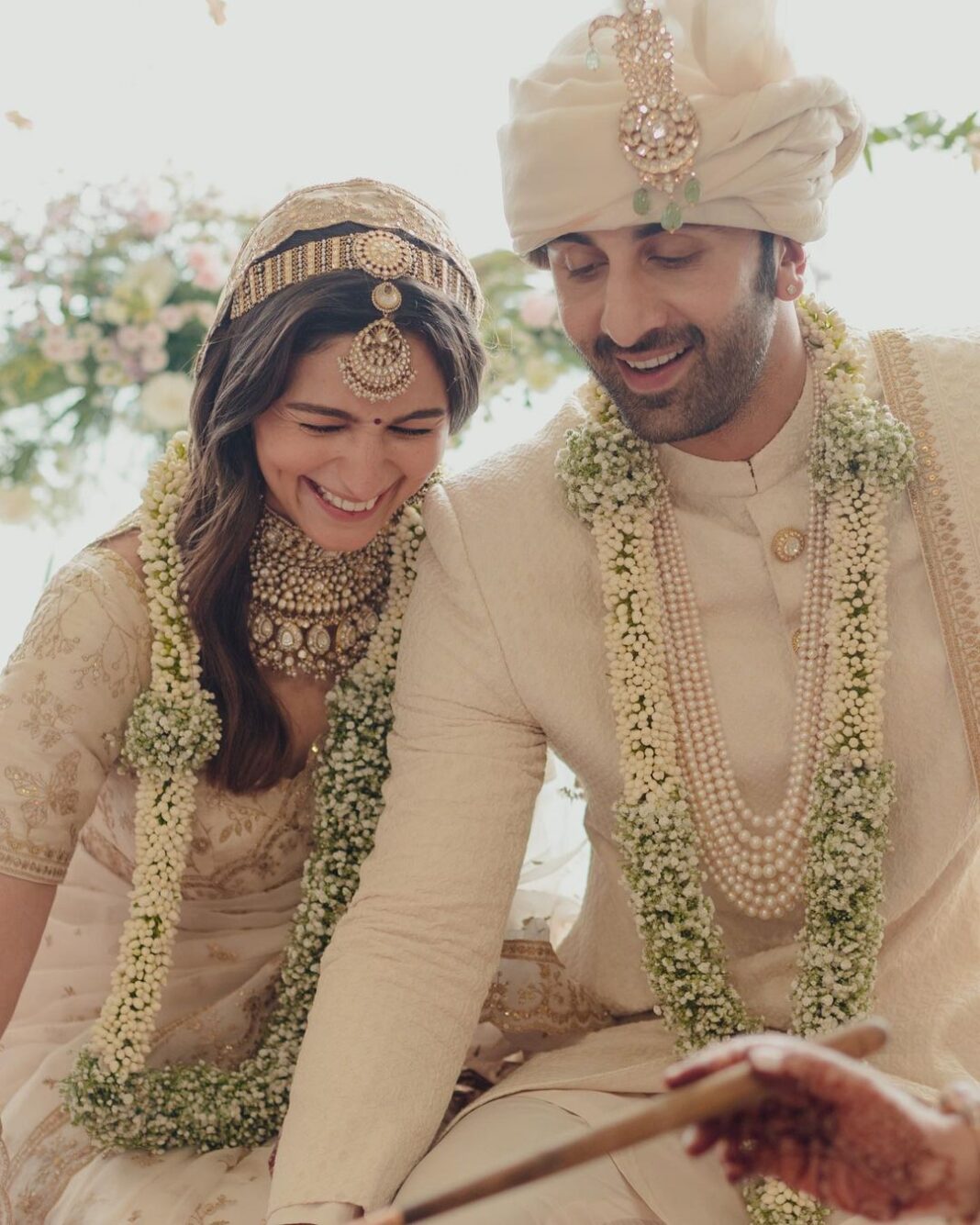 Alia Bhatt Instagram - Today, surrounded by our family and friends, at home … in our favourite spot - the balcony we’ve spent the last 5 years of our relationship - we got married. With so much already behind us, we can’t wait to build more memories together … memories that are full of love, laughter, comfortable silences, movie nights, silly fights, wine delights and Chinese bites. Thank you for all the love and light during this very momentous time in our lives. It has made this moment all the more special. Love, Ranbir and Alia ✨♥️♾