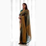 Aparna Balamurali Instagram - 💚 Shot by my fav @_pixel.ninja_ ! ✨ Wearing this beautiful saree from @thebrandstorebyfebitha 💚 Styled by @styled_by_gk 💕