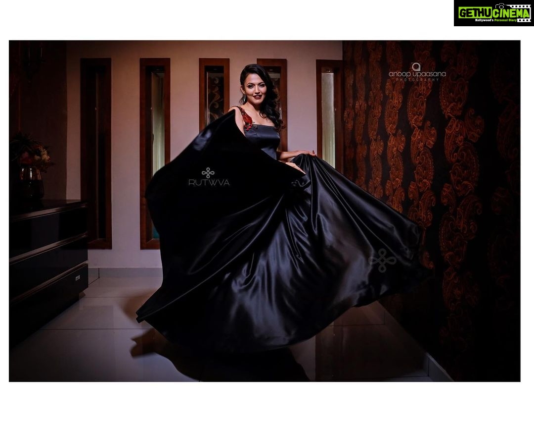 Aparna Das Instagram - .π€β¨π€. . βA girl should be two things..classy and fabulous!β - Coco Chanel . . Jet black voluminous gown with contrast handwork on the sleeve straps in blood red and olive tones.This simple gown with minimal embroidery proves once again that, βLess is definitely more!!β Drop a message or watsapp on 9207675346/8848874044 for queries and orders. Muse : @aparna.das1 Photography : @anoopupaasana_photography Makeup&hair : @sajithandsujith Outfit&styling : @rutwva_insta