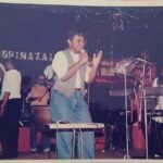 D. Imman Instagram - A Nostalgic pic! During my school times! Where artistic performance give that high to any musician! Ever grateful! (Late Music Director Aadithyan on the right) PC:- Mr.Bosco (Andimazhai Orchestra) Praise God!