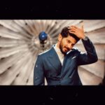 Dulquer Salmaan Instagram - Hair needs no fixing 🥸 #poser #throwinitback #shootshoots #bts #broll #thezoyafactor