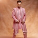 Karan Johar Instagram - Shaadi Tayaar … dil me bahut saara pyaar … dhal gayee jawaani … but mid life crisis hai to pehen liya Manish Malhotra ki sheravani! Chand Jaisi Alia Raaja humare RK! Rab ne bana di jodi woh bhi saj dhaj ke! Styled by @ekalakhani hair @darshanyewalekar make up @paresh_kalgutkar 📷 @maajidkhan88 managed by @len5bm in @manishmalhotra05