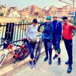 Manisha Koirala Instagram - One of the best mornings of my life cycling to my favourite #patandurbarsquare and tiny lanes of #kathmandu !! Gorgeous temples we got chance to pray 🙏🏻 #heritagesitesofnepal #patan @saroshpradhan @choendenla @siddhartha.koirala